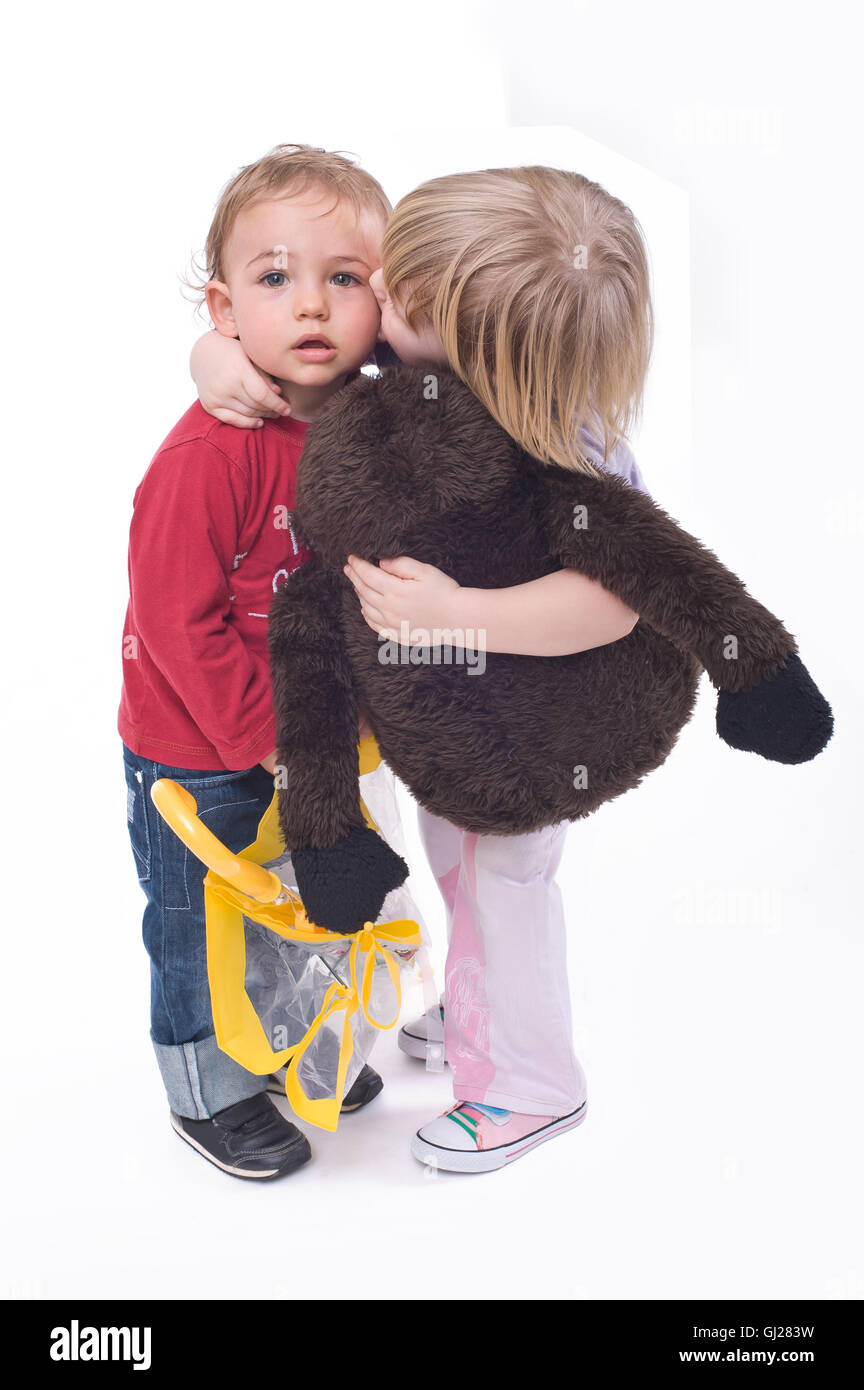 Little girl kissing little boy Stock Photo