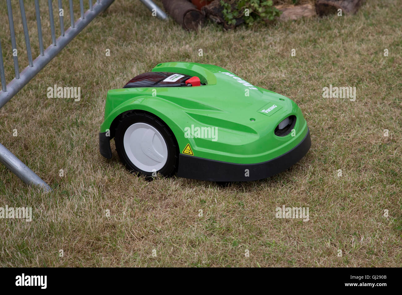Green Viking MI 422 P iMow robotic lawn mower cutting grass Countryfile Live Blenheim UK Stock Photo