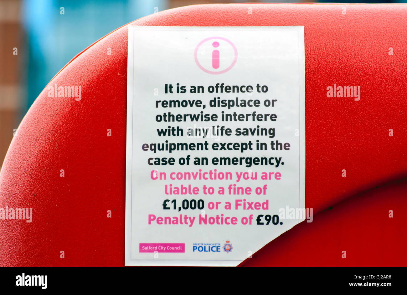 Sign Warning of Action for Tampering with Life Saving Equipment Stock Photo