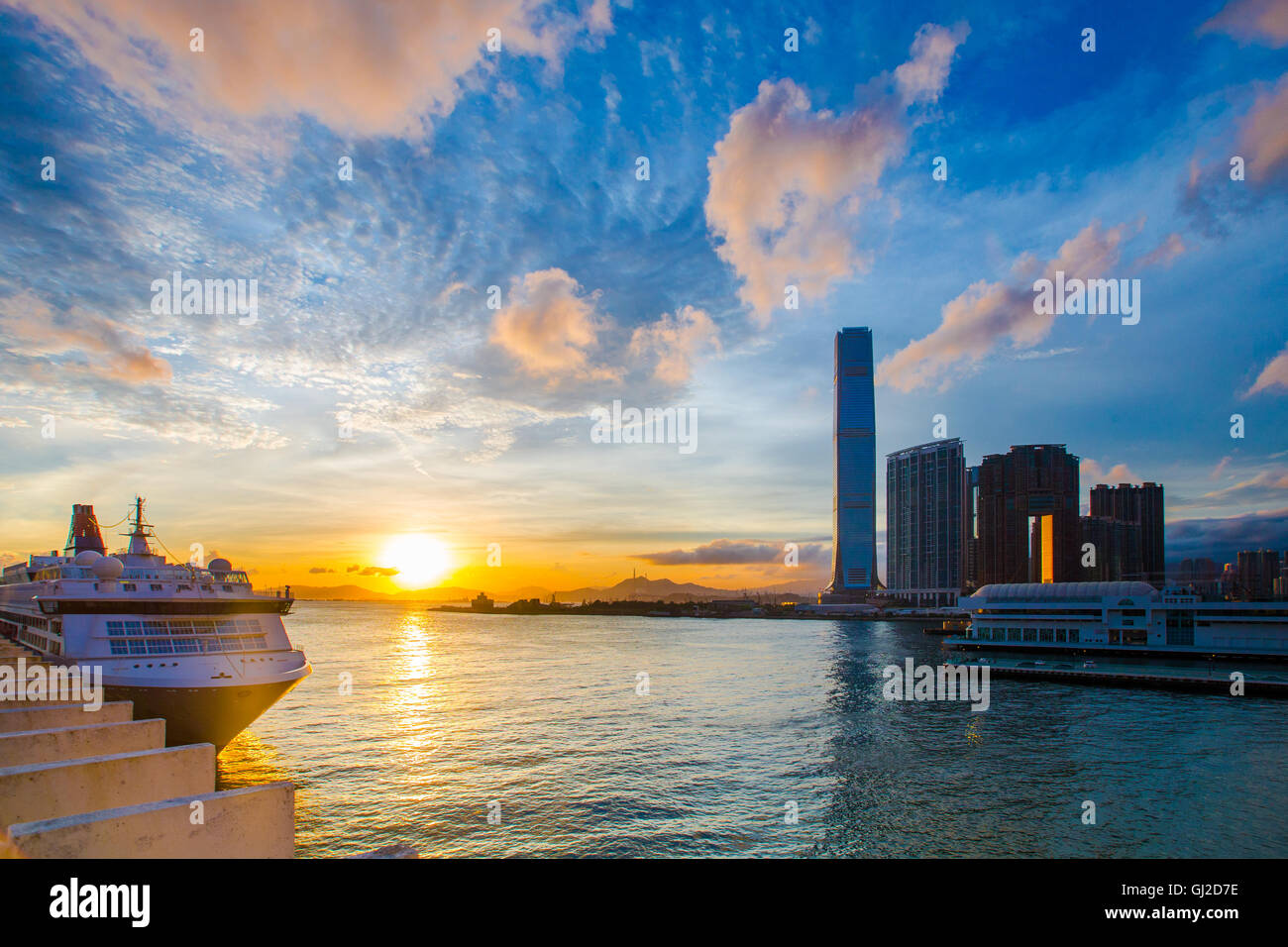 Cruise Terminal at Sunset - Victoria Harbor of Hong Kong Stock Photo ...