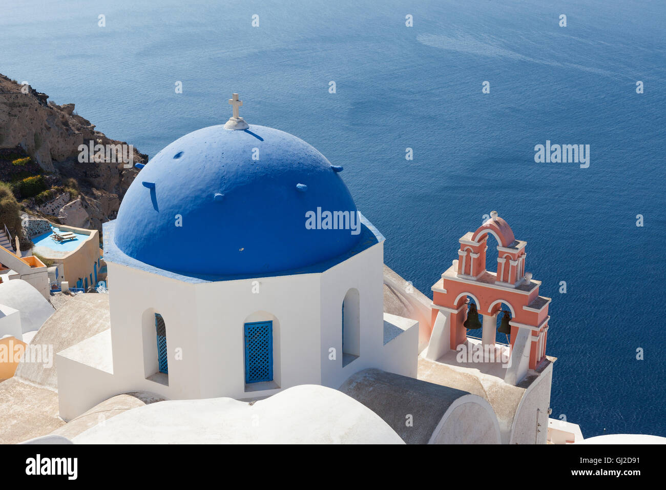 The Three bells of Fira and blue dome, Santorini, Greece Stock Photo ...