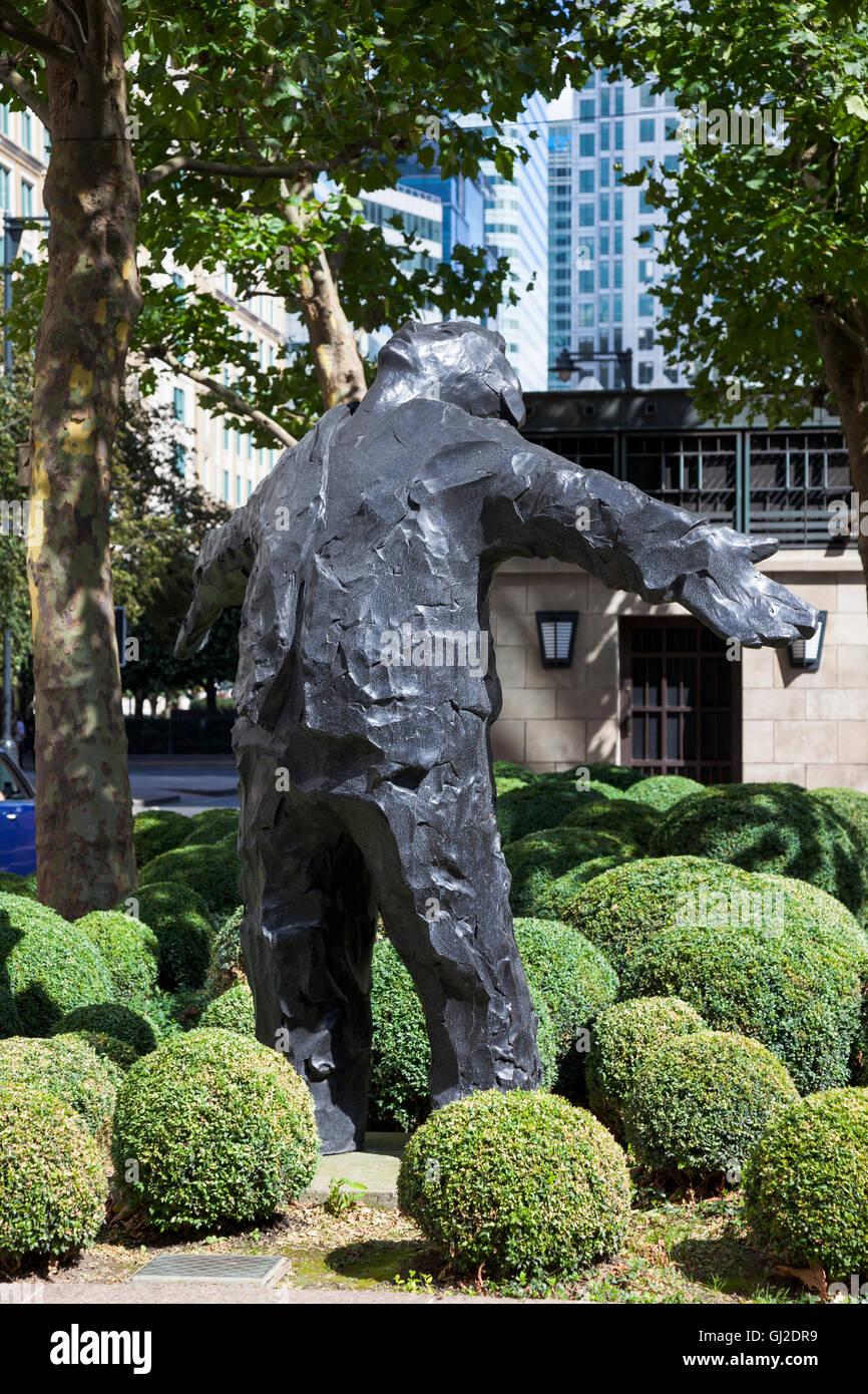 'Man with Arms Open' by Giles Penny, 1995, sculpture in Canary Wharf, London, UK Stock Photo