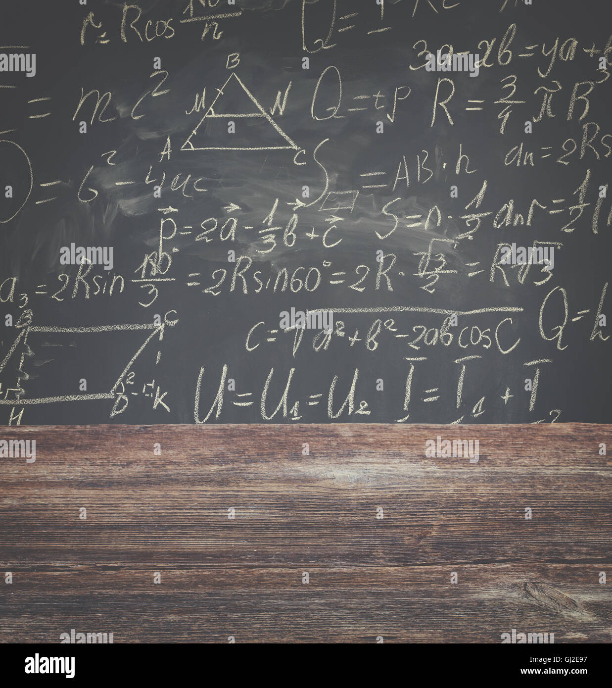 Complex mathematical calculations on blackboard Stock Photo - Alamy
