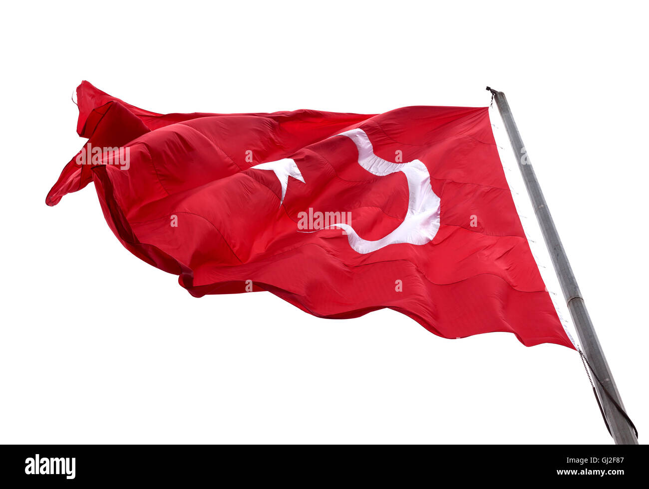 Flag of Turkey waving in wind day. Isolated on white background. Stock Photo