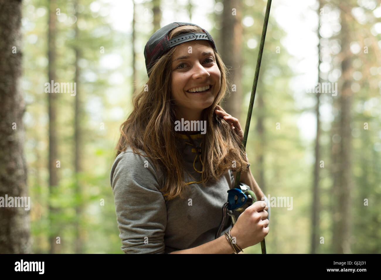 Portrait of young female climber in forest, Mount Hood National Forest, Oregon, USA Stock Photo