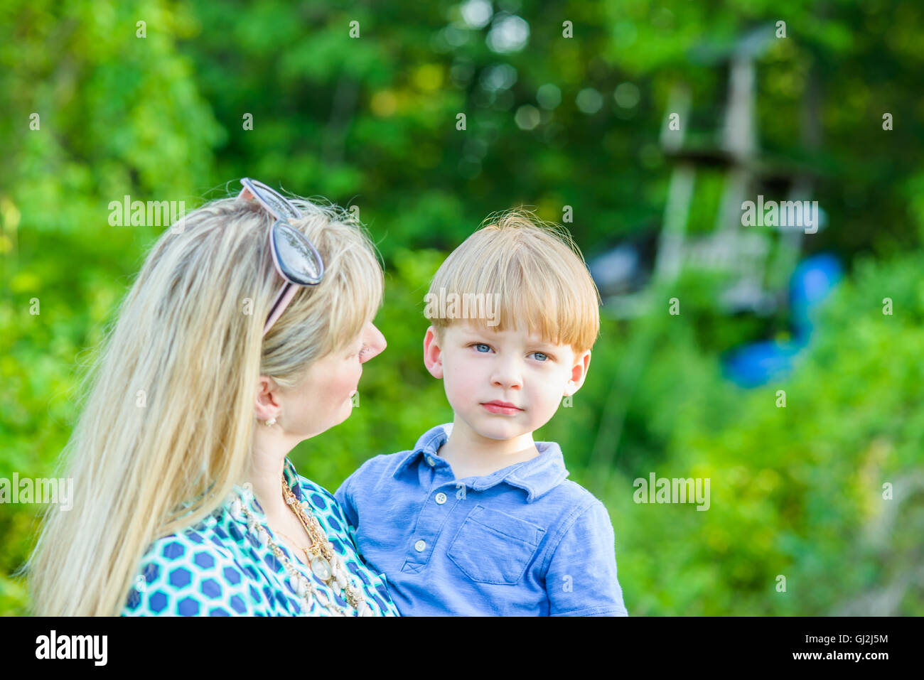 Mother holding son Stock Photo