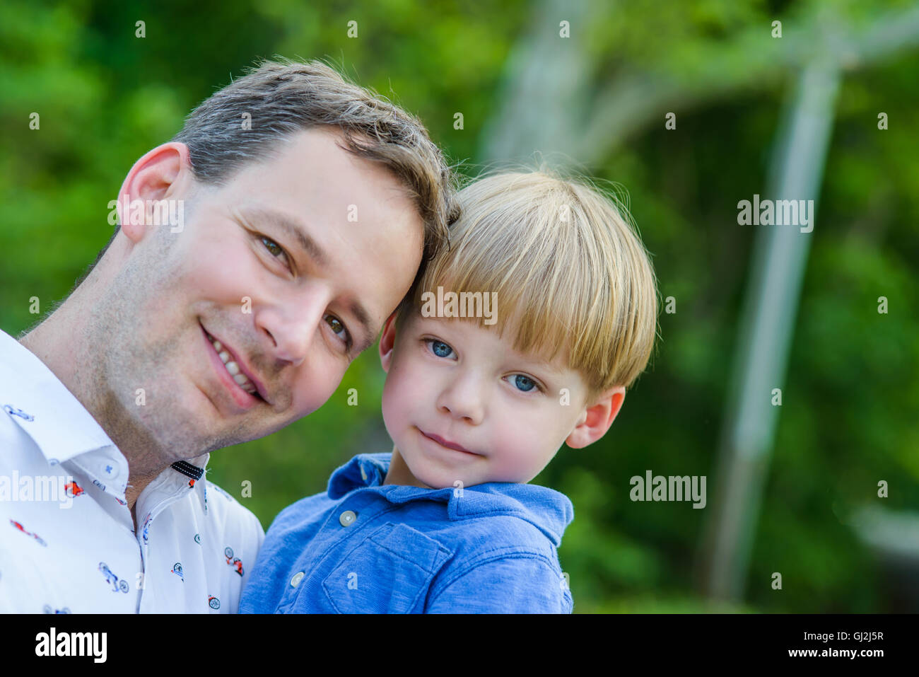 Son looking into camera hi-res stock photography and images - Alamy