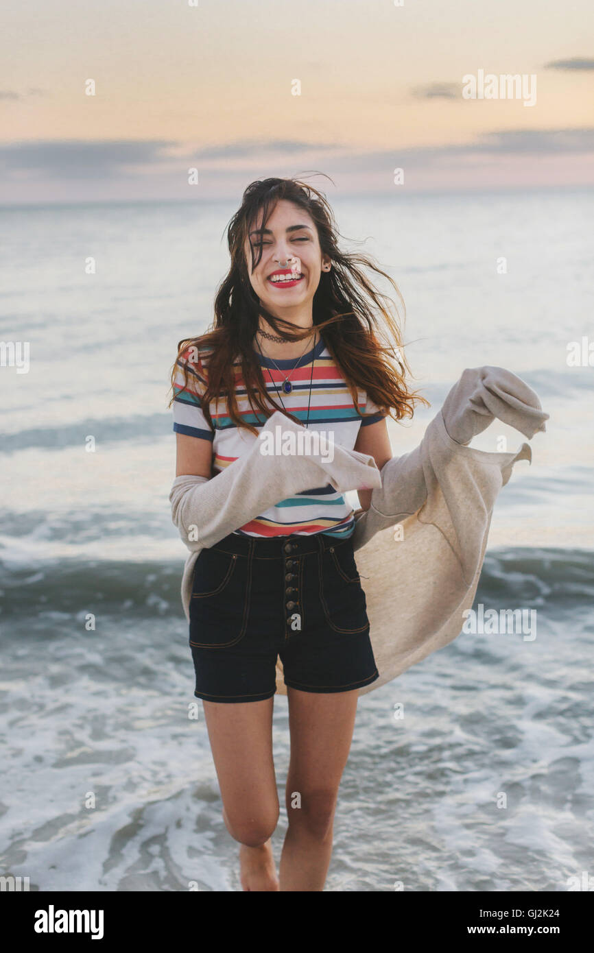 Happy woman on beach Stock Photo - Alamy