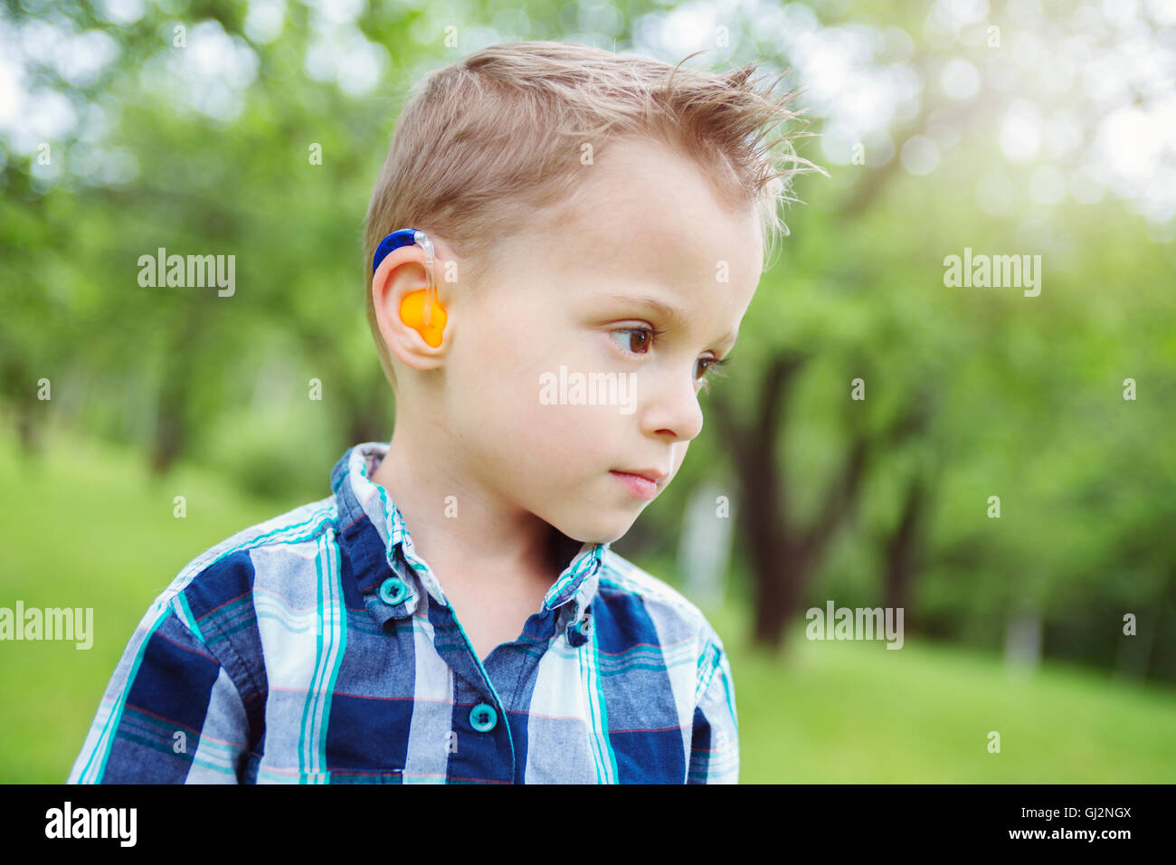 A Portrait of cute little boy child outdoors on the nature Stock Photo ...