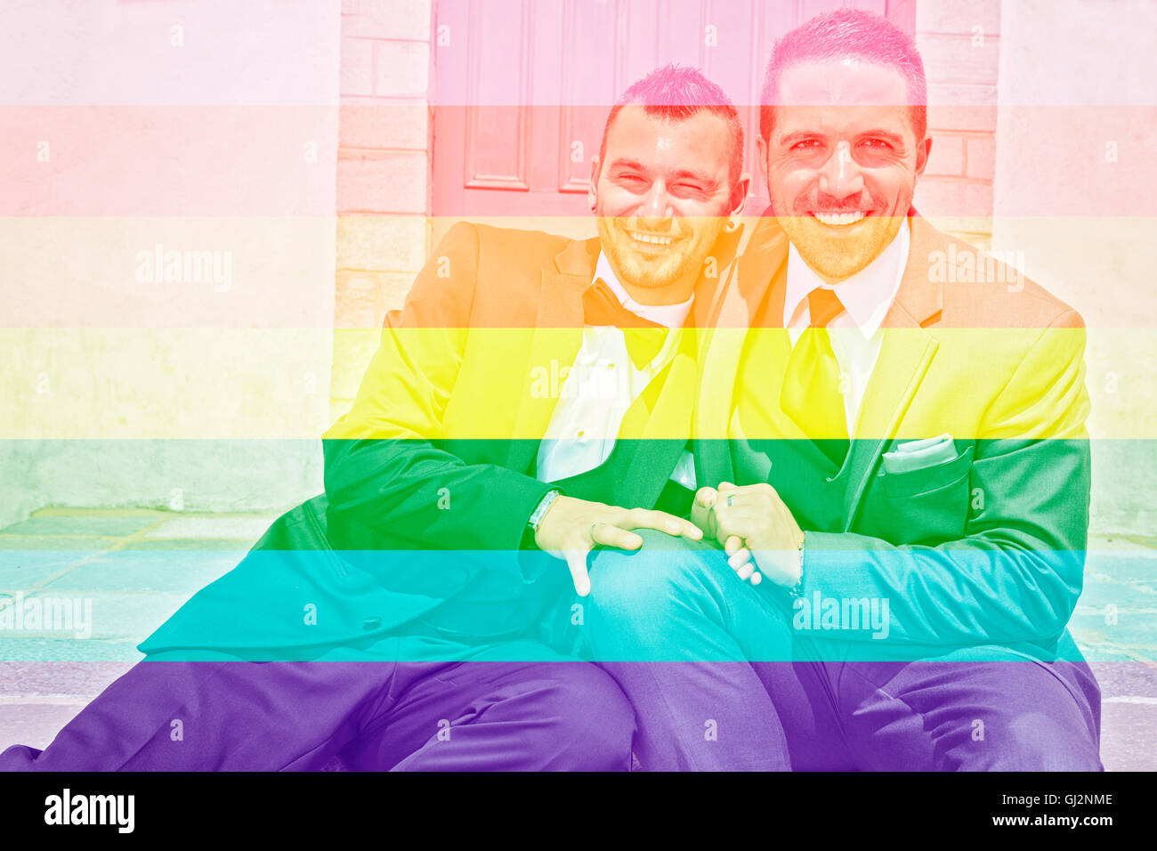 A Portrait of a loving gay male couple on their wedding day. Stock Photo