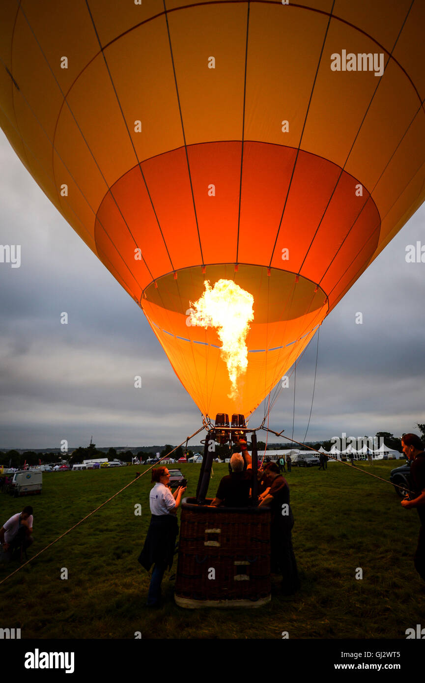 Crews fire the burners to inflate a hot air balloon at Bristol