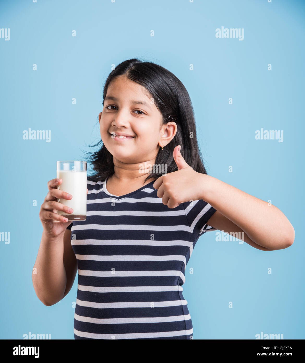 Toddler Girl Drinking Milk From A Bottle Stock Photo, Picture and Royalty  Free Image. Image 102654580.