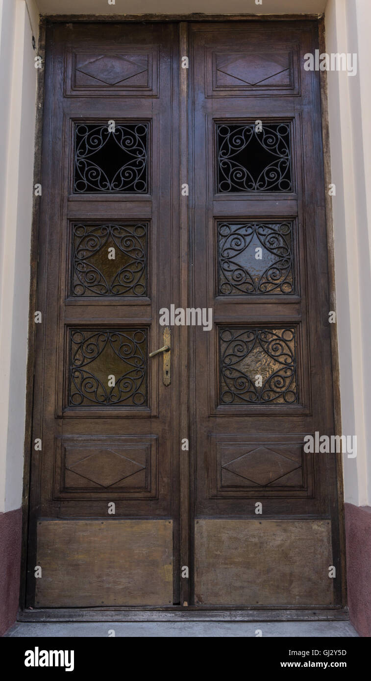 Old beautiful door in Chernivtsi, Ukraine. The main entrance to the building. Stock Photo