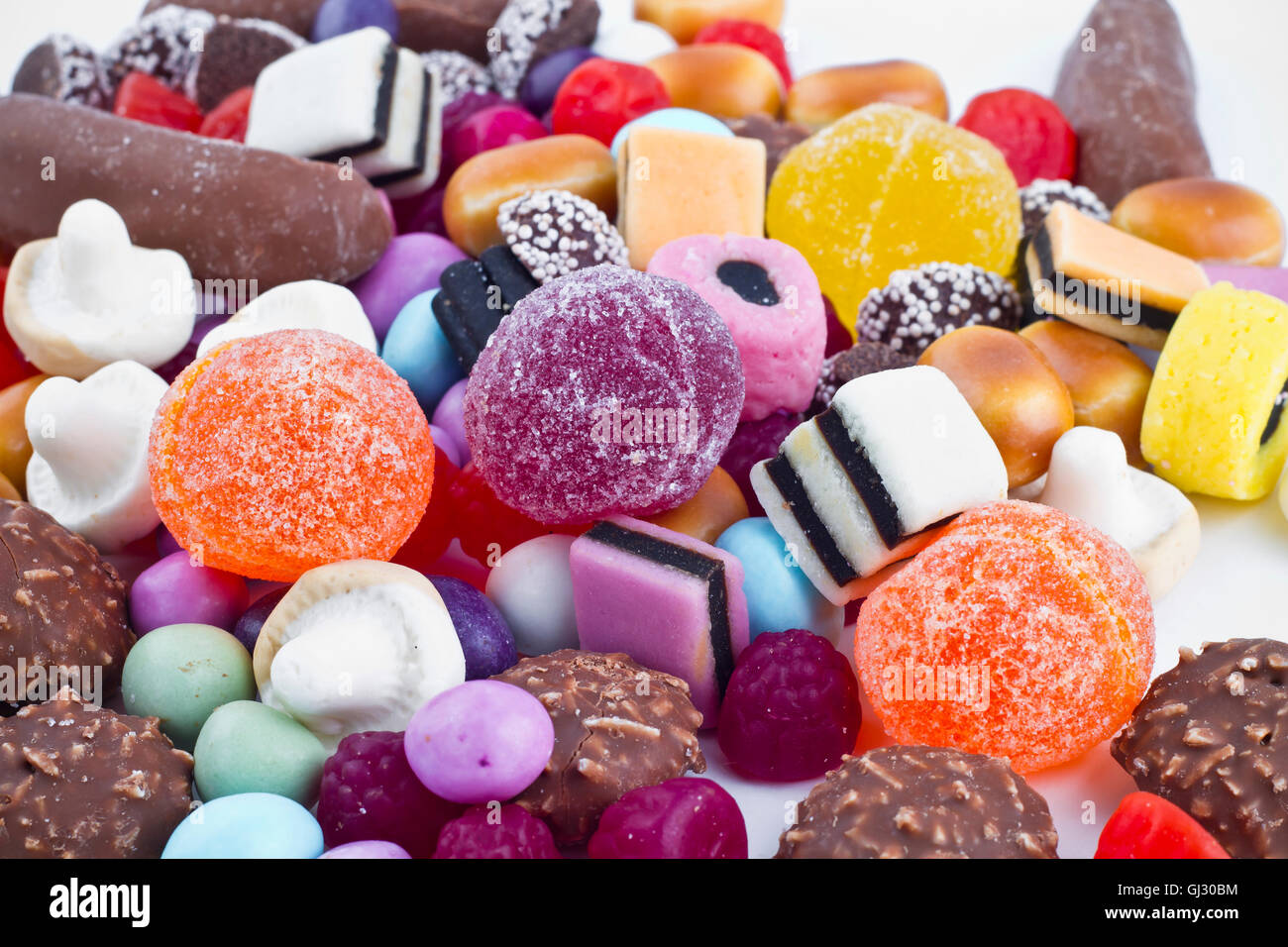 Candy Mountain over white background Stock Photo - Alamy