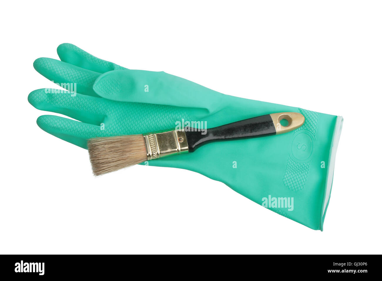 One green rubber glove and brush Stock Photo Alamy