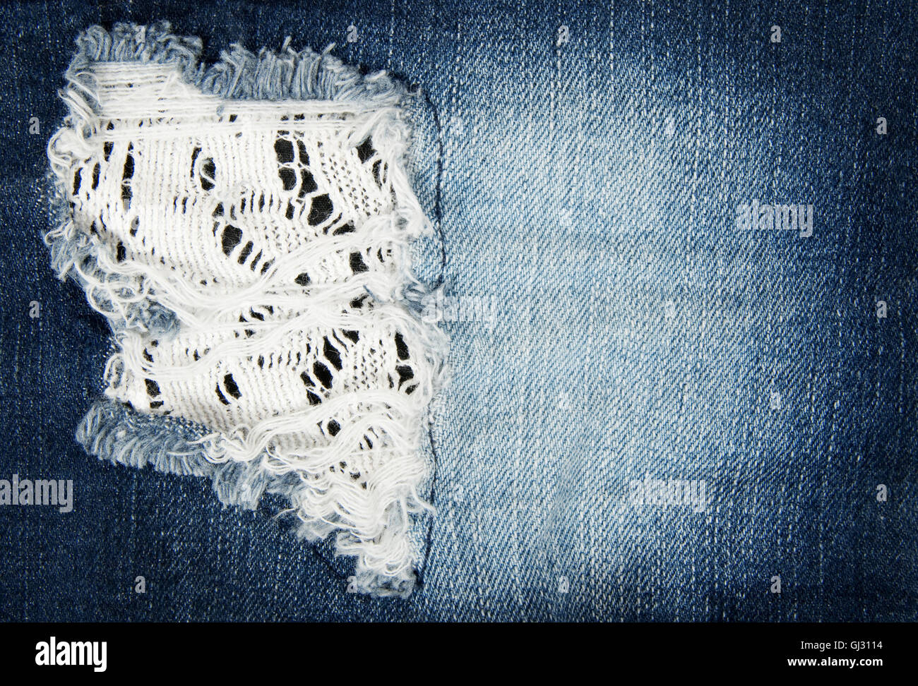 Worn out blue denim fabric Stock Photo