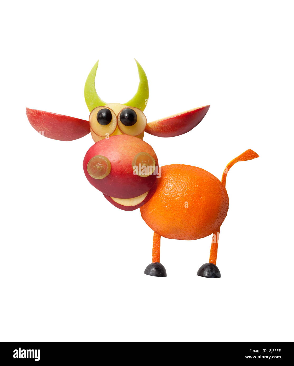 Happy bull made of fruits on white background Stock Photo