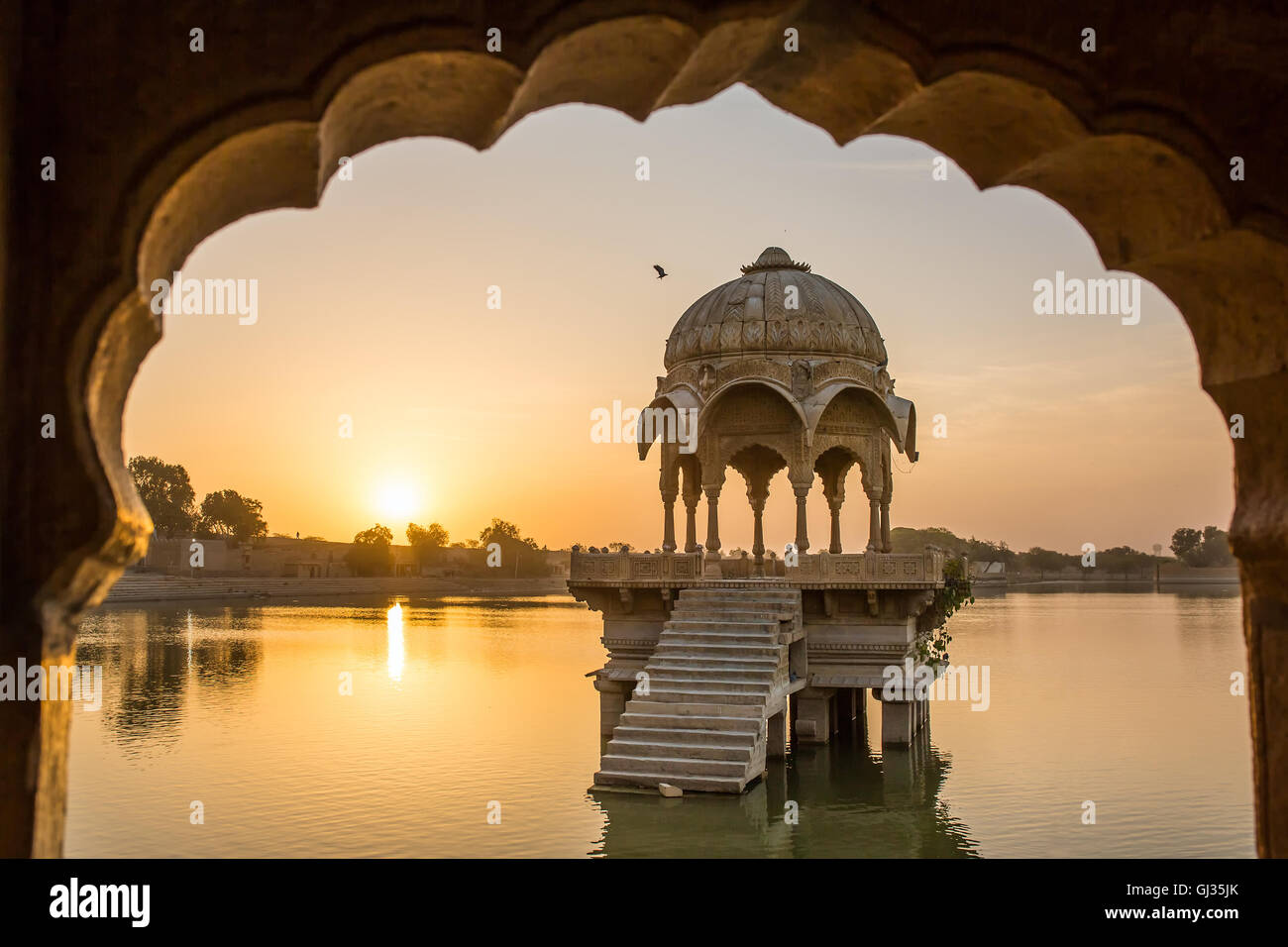 Gadi Sagar - artificial lake view through arch. Jaisalmer, Rajasthan, India Stock Photo