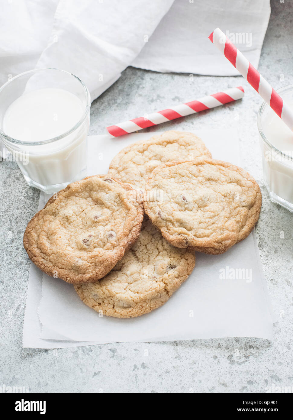 Chocolate chip cookies with milk Stock Photo Alamy