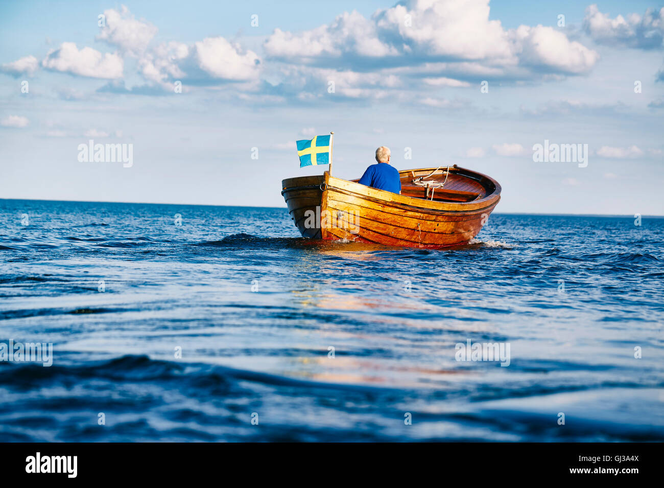 Man over boat hi-res stock photography and images - Alamy