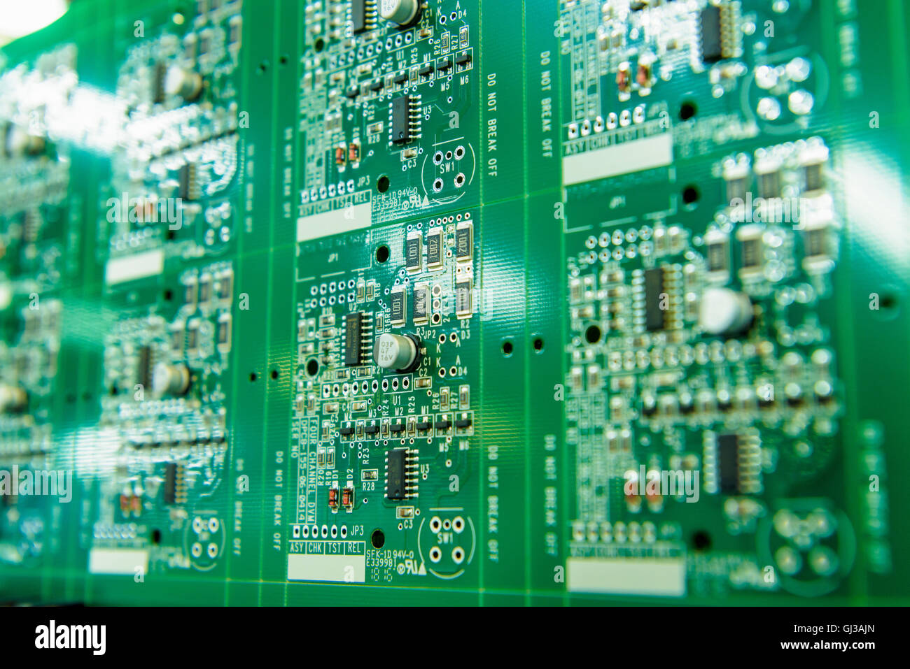 Detail of circuit boards in circuit board assembly factory, close up Stock Photo