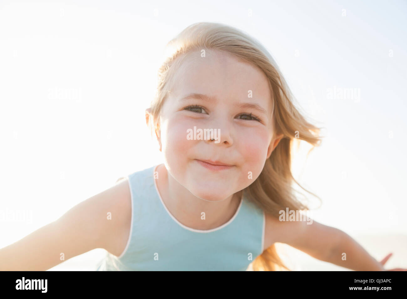 Portrait of girl looking at camera smiling Stock Photo - Alamy