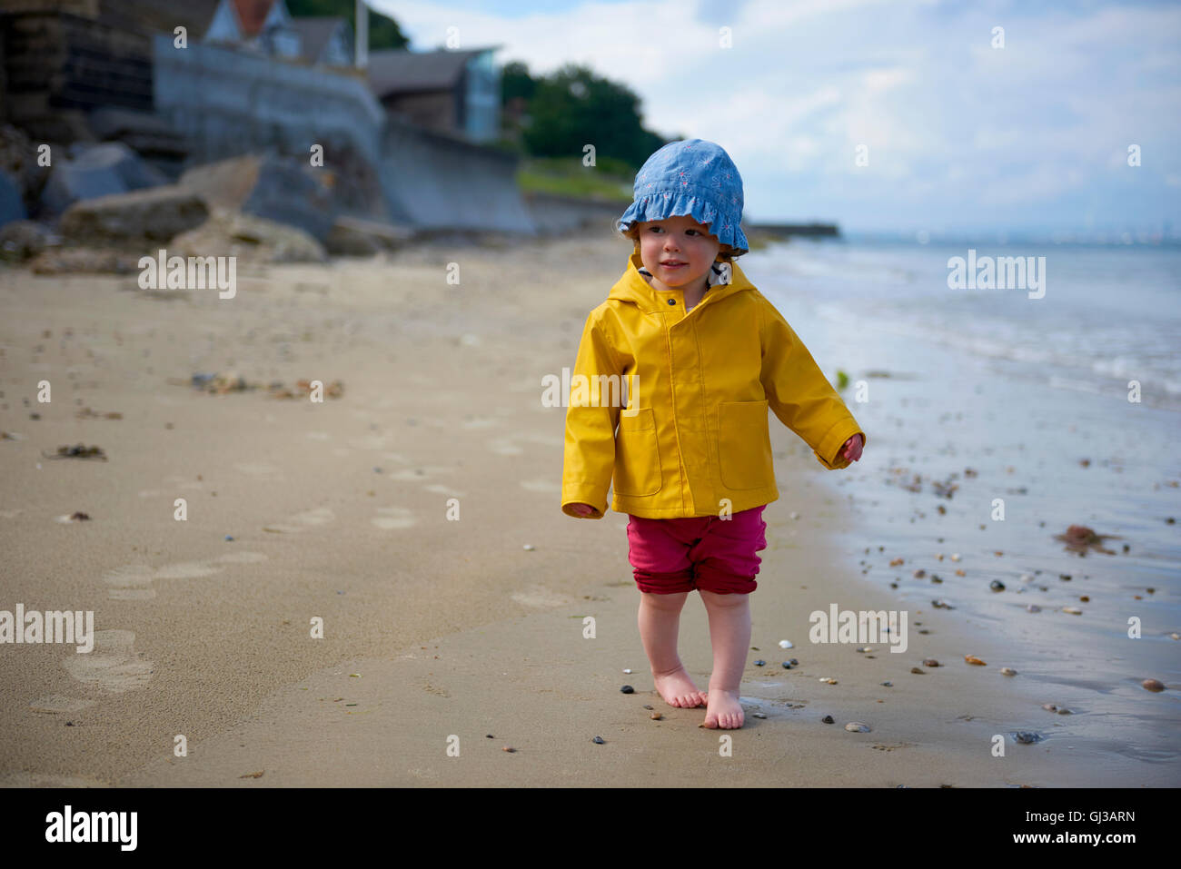 baby in raincoat