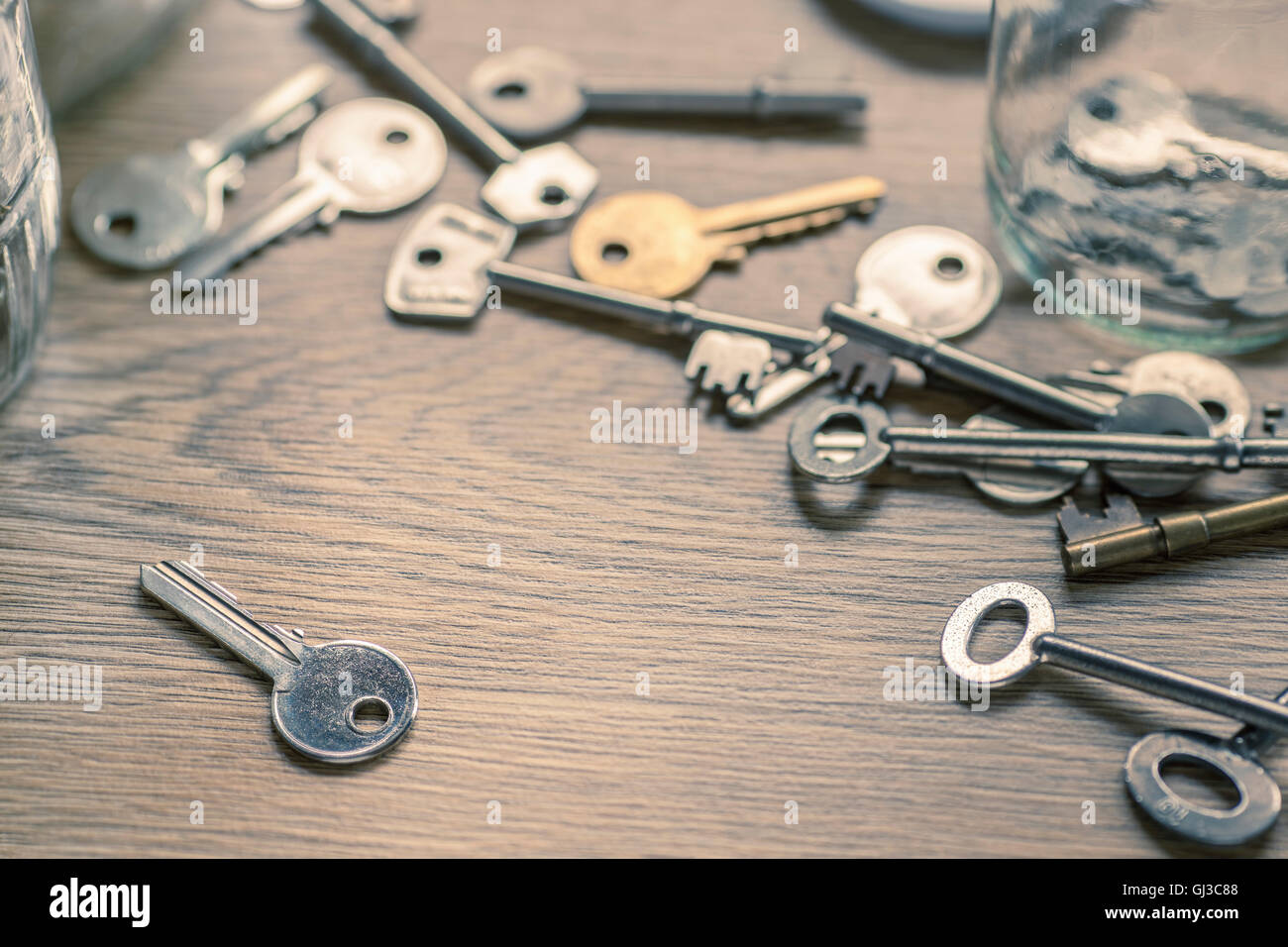 Keys on wooden surface Stock Photo
