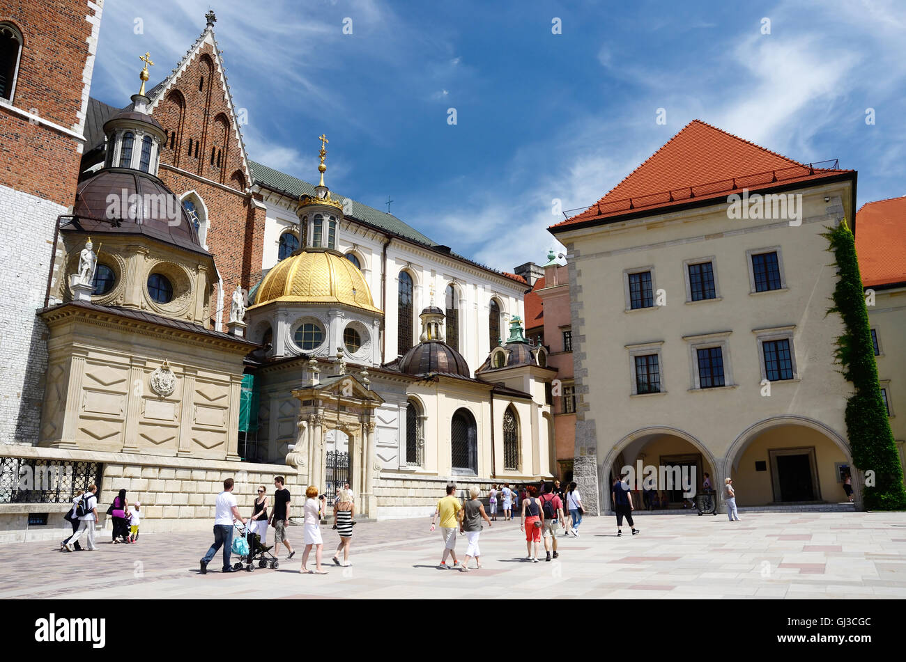KRAKOW, POLAND - JUNE 16: Unidentified tourists visiting Wawel cathedral,Royal Castle in Krakow, Poland on June, 16, 2013.Krakow Stock Photo