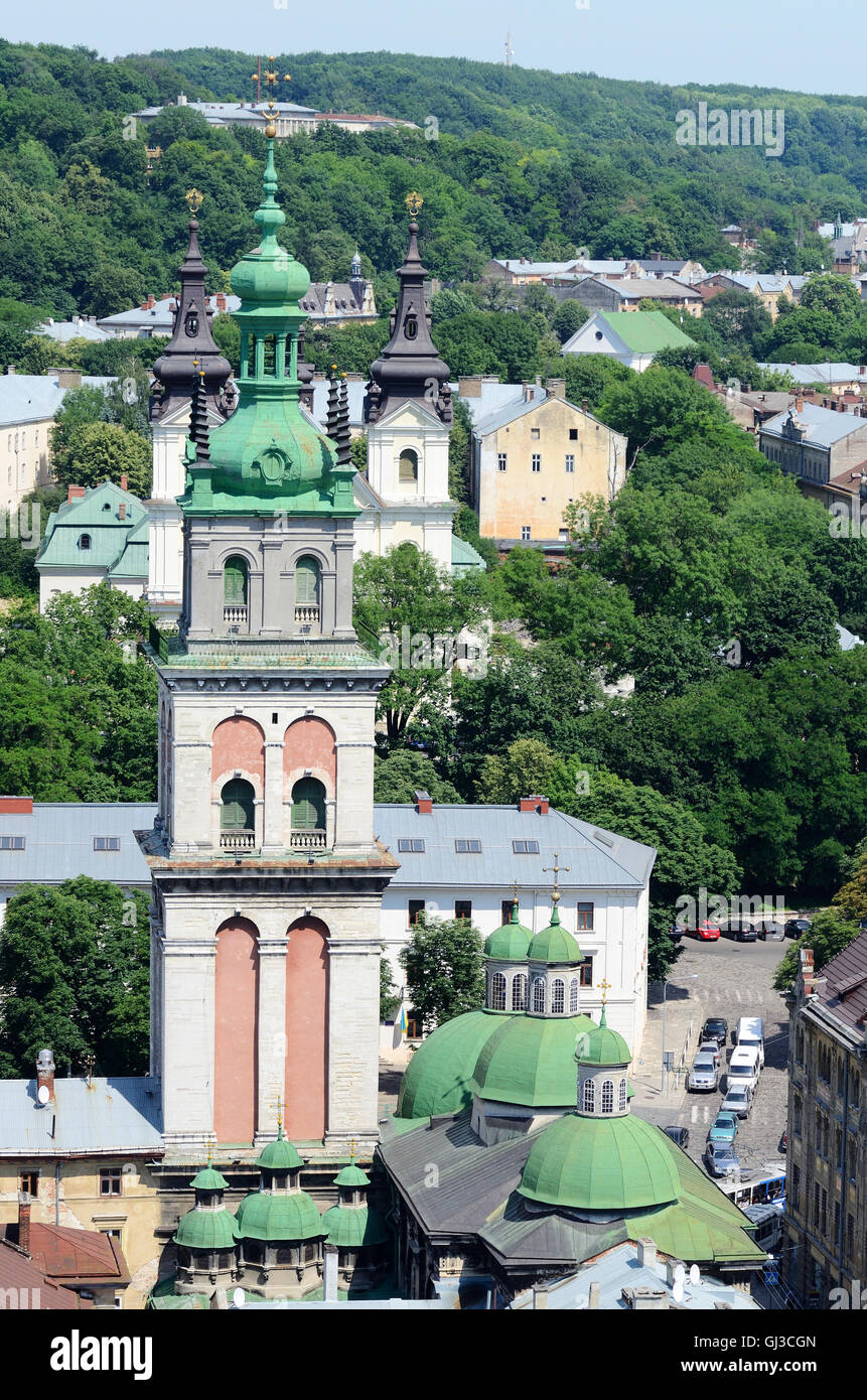 Dormition or Assumption Church with the 400 years old Korniakt Tower,Lvov,Ukraine.View from city hall.Historical center listed a Stock Photo