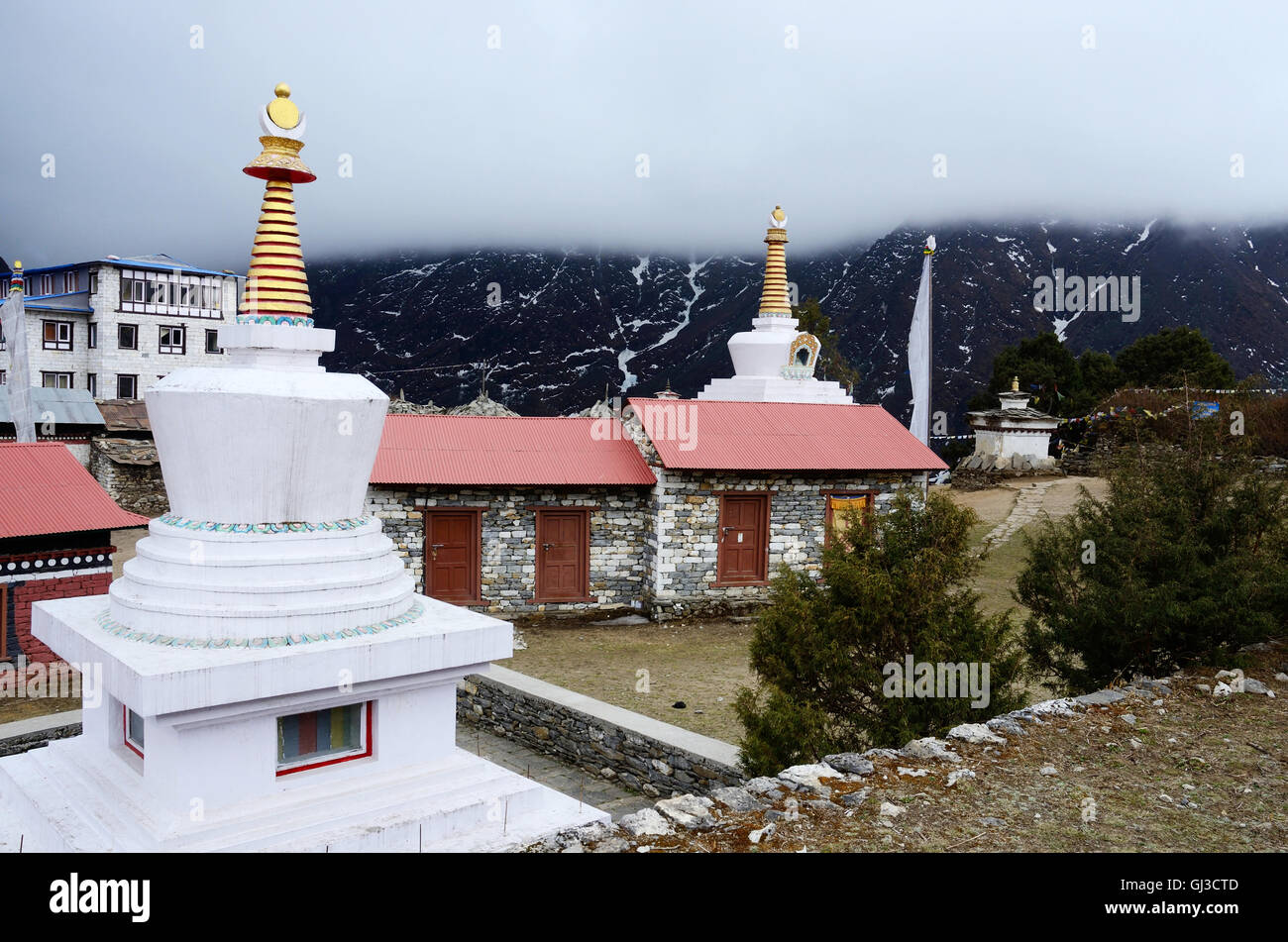 Small stupas in Tengboche buddhist monastery covered with the cloud,Everest region,Nepal Stock Photo