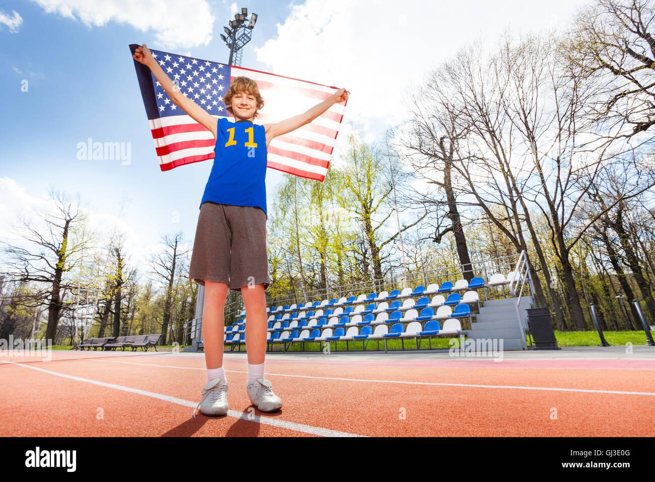 American young athlete on the track in summer Stock Photo