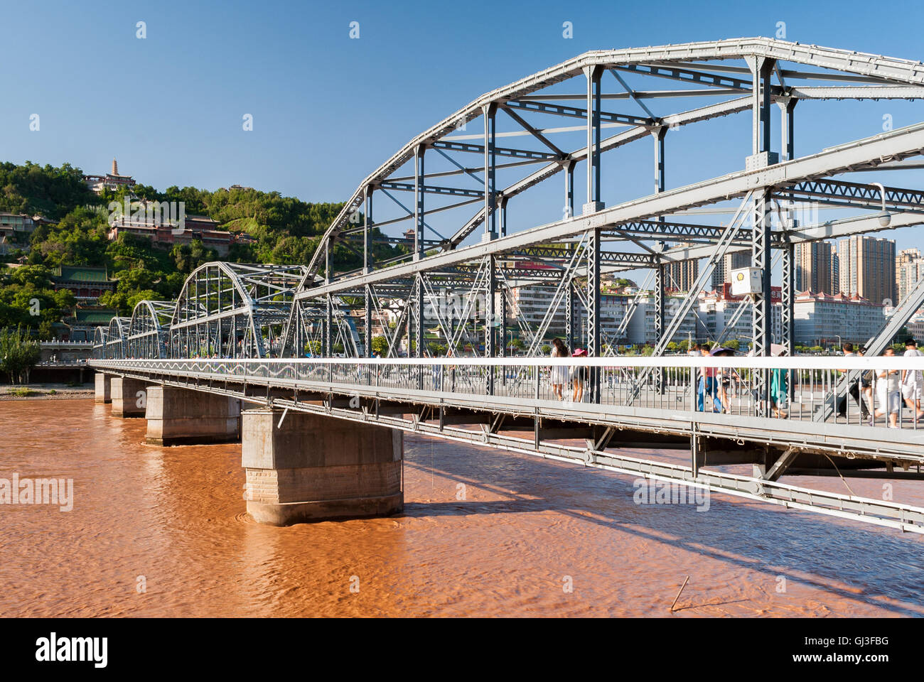 The Zhongshan Bridge in Lanzhou (China) during a sunny afternoon Stock Photo