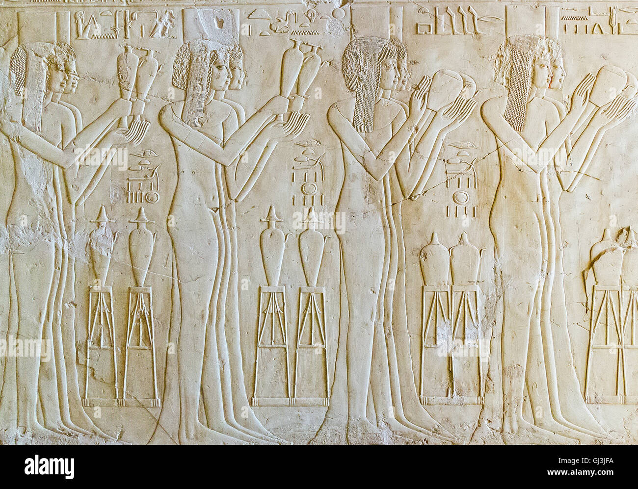 Egypt, Luxor, tomb of Kheruef, 8 young women, maybe princesses, daughters of foreign rulers, raised at Pharaoh's court. Stock Photo