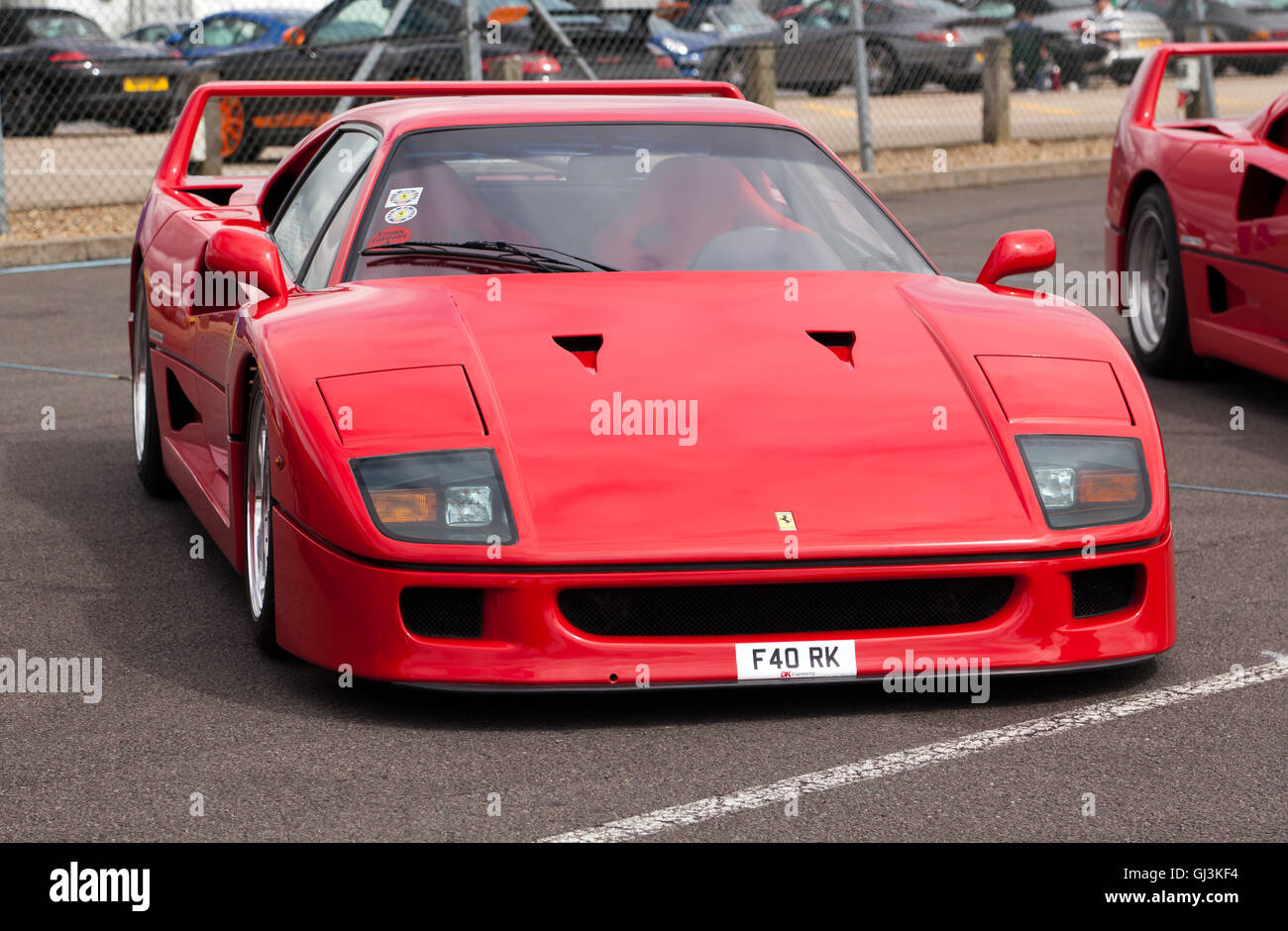 Three-quarter view of a Ferrari F40 in the Ferrari Owner's Club of Great Britain area of the Silverstone Classic 2016 Stock Photo