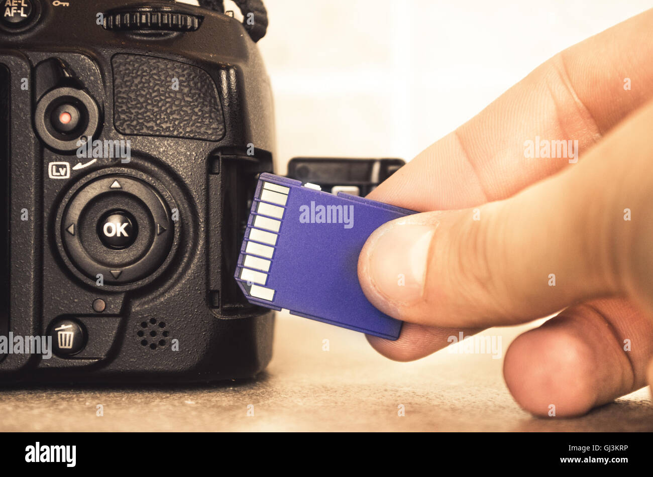 Sd card camera hand hi-res stock photography and images - Alamy
