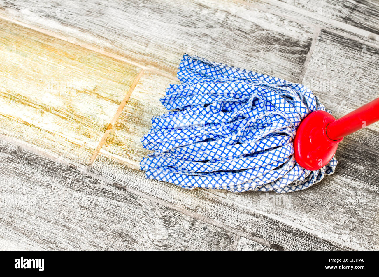 wipe floor mop chores housekeeping Stock Photo