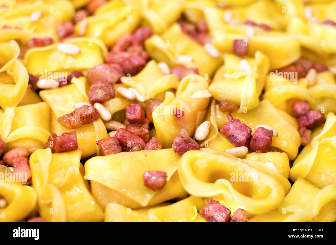 bacon pasta closeup cappelletti background Stock Photo