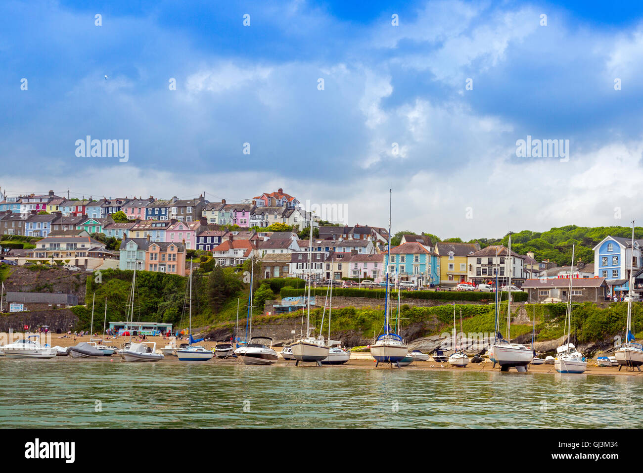 Rows of colourful houses overlook the harbour in New Quay, Ceredigion