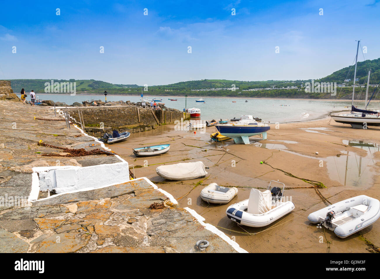 New Quay harbour wall at low water, Ceredigion, Mid Wales, UK Stock Photo