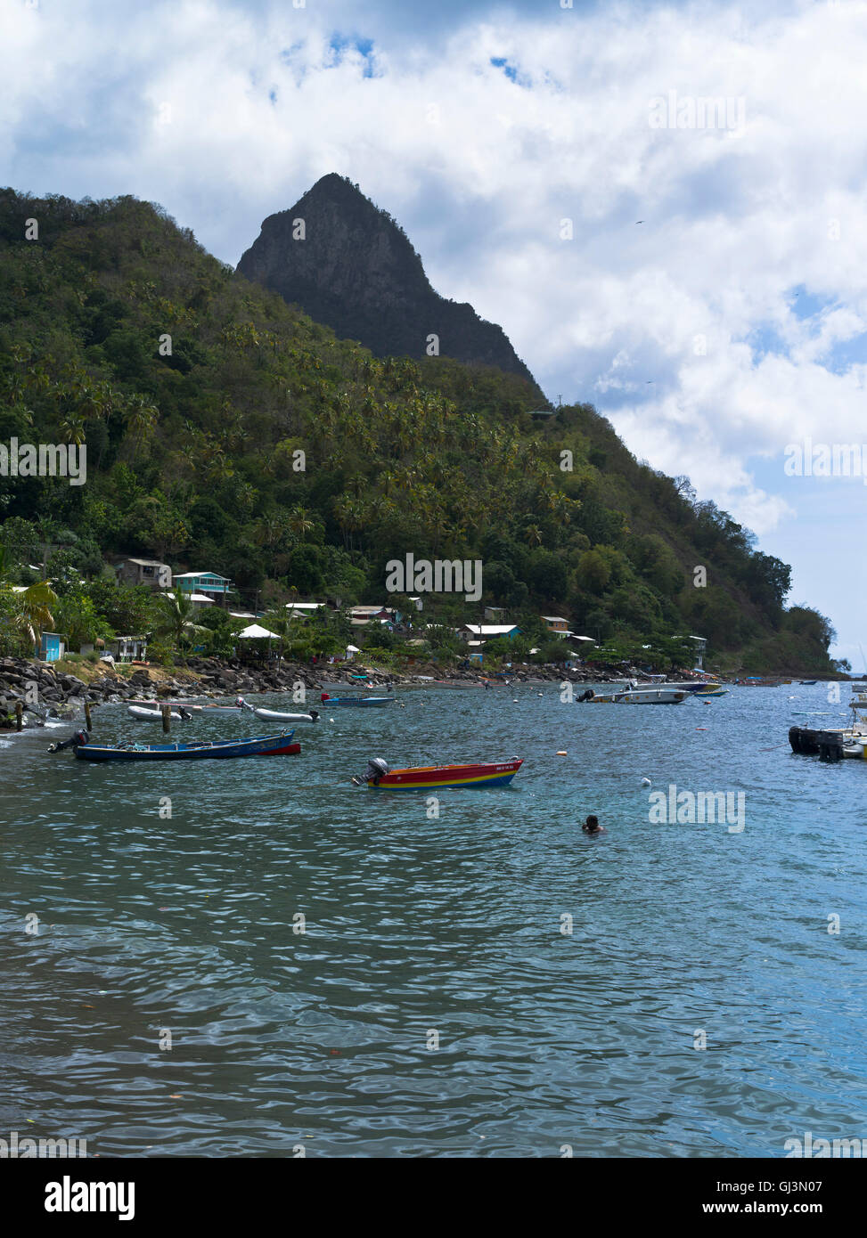 dh Soufriere ST LUCIA CARIBBEAN Piton peak World Heritage mountain boats bay beach pitons Stock Photo