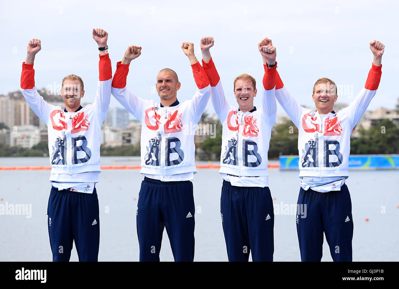 (left to right) Great Britain's Alex Gregory, Mohamed Sbihi, George Nash and Constantine Louloudis celebrating winning the gold medal in the Men's Four Final at The Lagoa Stadium on the seventh day of the Rio Olympic Games, Brazil. Picture date: Friday August 12, 2016. Photo credit should read: Mike Egerton/PA Wire. RESTRICTIONS - Editorial Use Only. Stock Photo