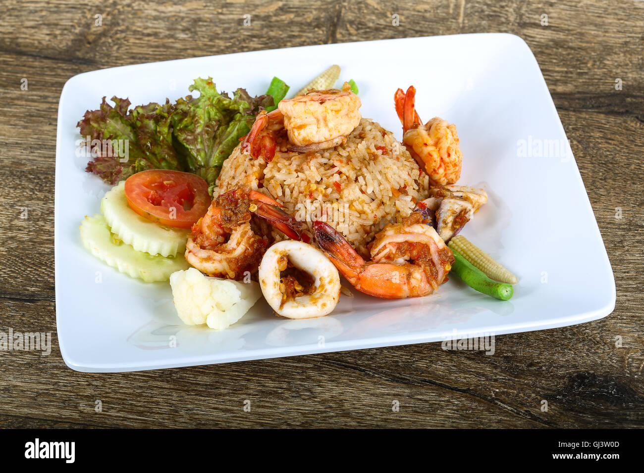 Asian style Fried rice with seafood, herbs and spices Stock Photo - Alamy