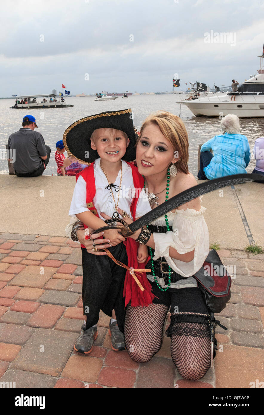 Young boy (three years old) and his mom, dressed as pirates for Contraband Days in Lake Charles, Louisiana Stock Photo