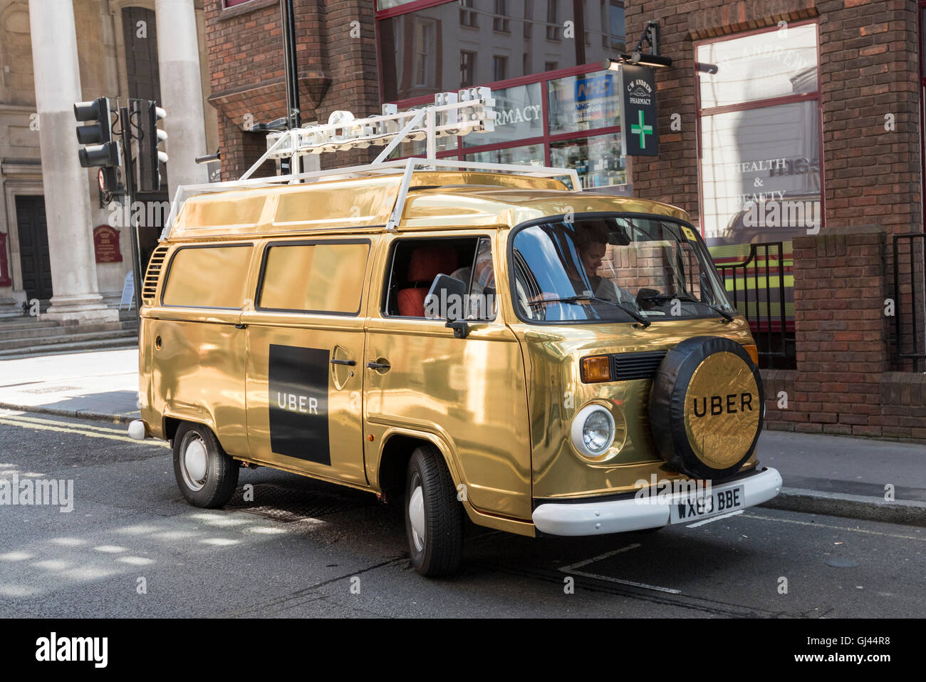 London UK. 12 August 2016. A gold coloured VW camper van marked