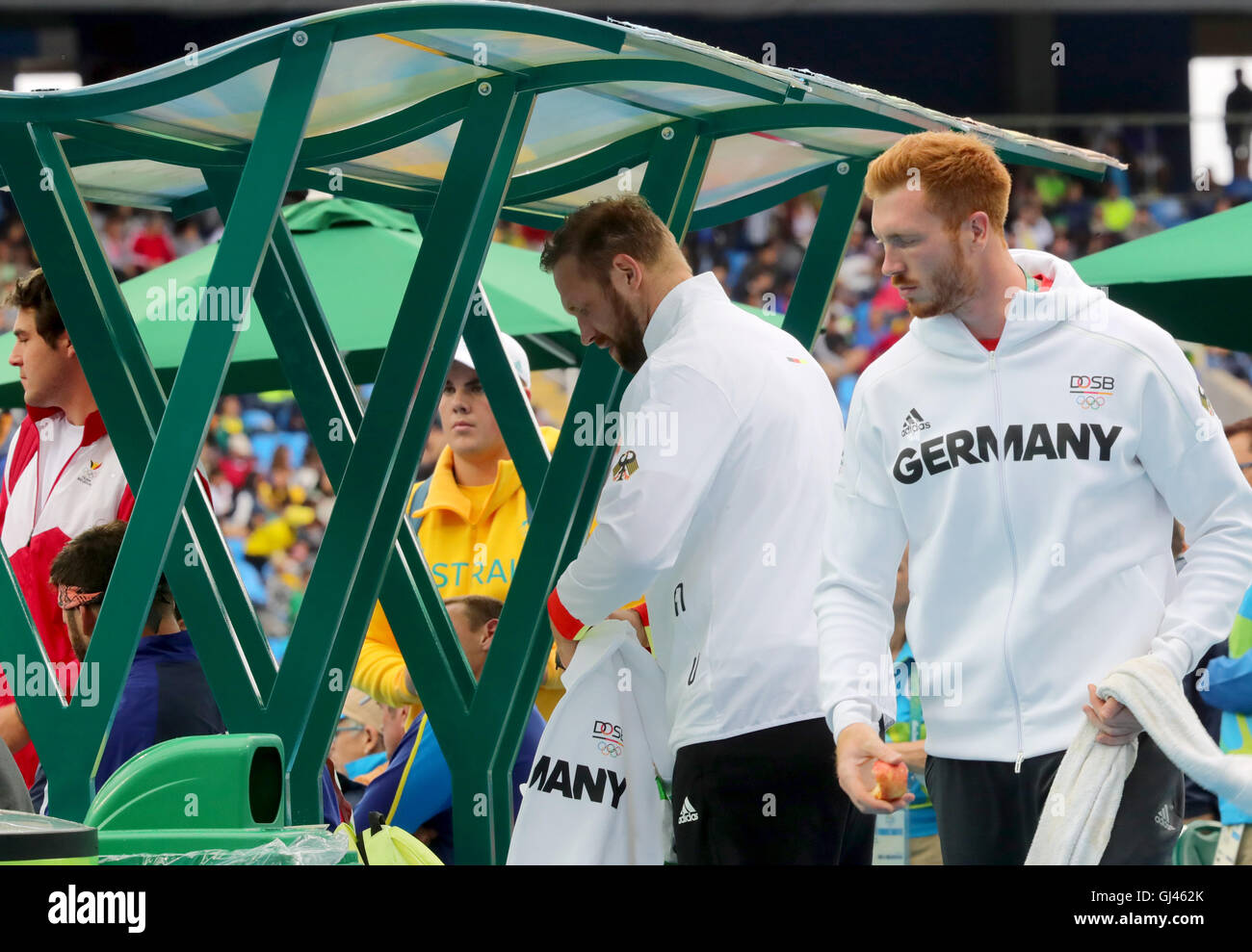 Rio de Janeiro, Brazil. 12th Aug, 2016. Robert (C) and Cristoph Harting of Germany compete in