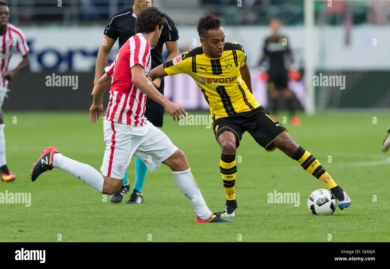 St. Gallen, Switzerland. 9th Aug, 2016. Dortmund's Pierre-Emerick Aubameyang (r) and Bilbao's Mikel San José vie for the ball during the friendly soccer match between Borussia Dortmund and Athletic Bilbao in St. Gallen, Switzerland, 9 August 2016. PHOTO: GUIDO KIRCHNER/DPA/Alamy Live News Stock Photo