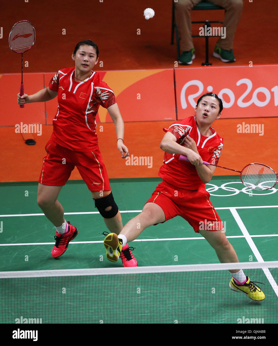 Rio De Janeiro, Brazil. 12th Aug, 2016. China's Luo Ying and Luo Yu compete against South Korea's Jung Kyung Eun and Shin Seung Chan during women's doubles group play stage match of Badminton at the 2016 Rio Olympic Games in Rio de Janeiro, Brazil, on Aug. 12, 2016. Jung Kyung Eun and Shin Seung Chan won the match 2-0. Credit:  Qin Lang/Xinhua/Alamy Live News Stock Photo