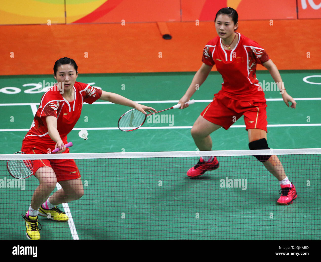 Rio De Janeiro, Brazil. 12th Aug, 2016. China's Luo Ying and Luo Yu compete against South Korea's Jung Kyung Eun and Shin Seung Chan during women's doubles group play stage match of Badminton at the 2016 Rio Olympic Games in Rio de Janeiro, Brazil, on Aug. 12, 2016. Jung Kyung Eun and Shin Seung Chan won the match 2-0. Credit:  Qin Lang/Xinhua/Alamy Live News Stock Photo
