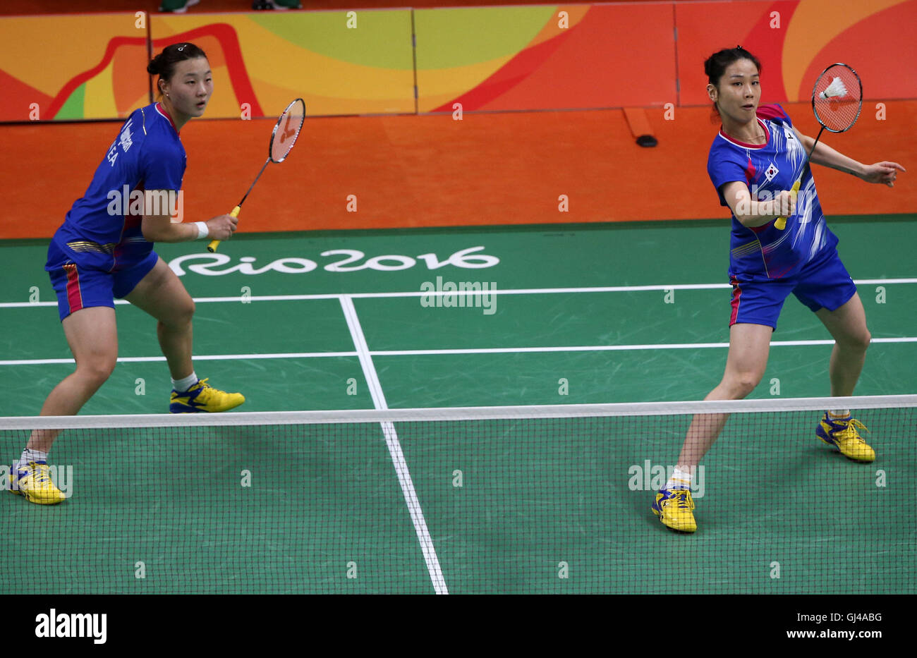 Rio De Janeiro, Brazil. 12th Aug, 2016. South Korea's Jung Kyung Eun (R) and Shin Seung Chan compete against China's Luo Ying and Luo Yu during women's doubles group play stage match of Badminton at the 2016 Rio Olympic Games in Rio de Janeiro, Brazil, on Aug. 12, 2016. Jung Kyung Eun and Shin Seung Chang won the match 2-0. Credit:  Qin Lang/Xinhua/Alamy Live News Stock Photo